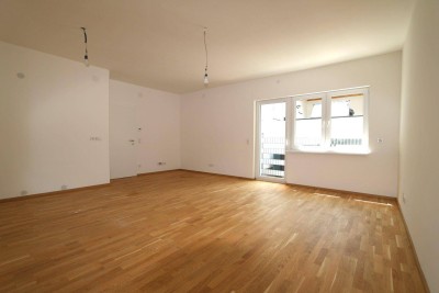 Sorgen Sie für Ihre Zukunft vor - ERSTBEZUG - SCHLÜSSELFERTIG! Perfekte 3-Zimmer-Wohnung mit ca. 75,16 m² großer Terrasse inkl. kleinen Grünbereichen