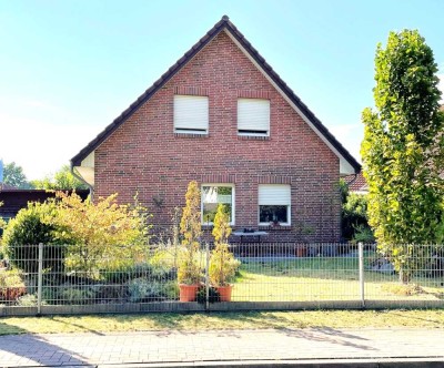 EFH mit 4 ZKB, pflegeleichten Garten u. Carport...