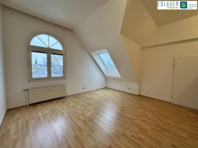 Zentral und ruhig gelegene Dachgeschoßwohnung mit Terrasse!