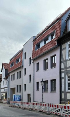 Neubau-Wohnung in zentraler Lage mit Balkon im EG