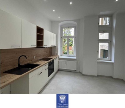Charmante 4-Zimmer-Wohnung im Hochparterre eines denkmalgeschützten Altbaus