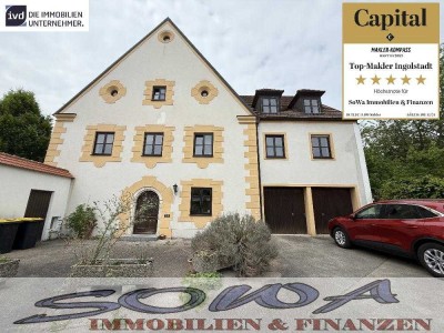 Attraktives Mehrfamilienhaus mit 5 Wohneinheiten, zwei Garagen und Garten in zentraler Lage in Ne...
