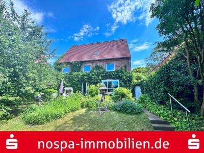 Wohnhaus über vier Ebenen! Voll unterkellertes Wohnhaus mit Garage und Terrasse