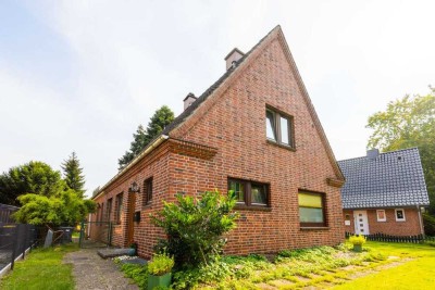 Viel Raum fürs Leben – charmantes Einfamilienhaus mit Dachterrasse und Gartenidylle