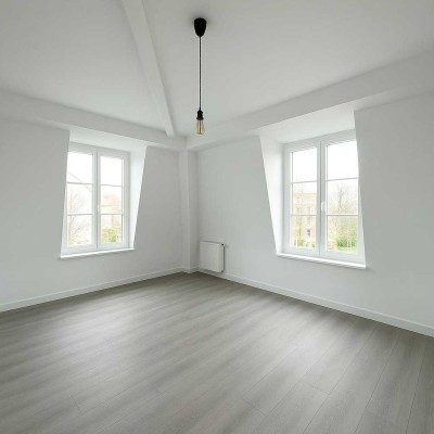 Erstbezug nach Renovierung: 2,5-Zimmer-Dachgeschosswohnung mit TG