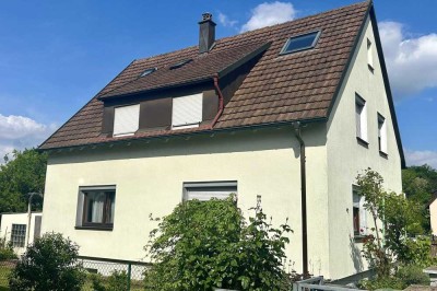 Einfamiliehaus in top Lage mit sonnigem Grundstück und großzügiger Garage - sanierungsbedürftig