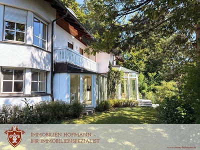 Charmante 2-Zimmer-Wohnung mit Wintergarten, großem Garten & Garage in gehobener Lage Landshuts!