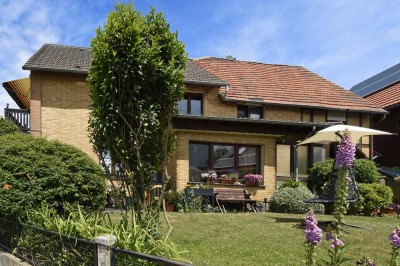 Charmantes Mehrfamilienhaus mit 3 Wohnungen und zusätzlichem Ausbaupotential mit herrlichem Blick