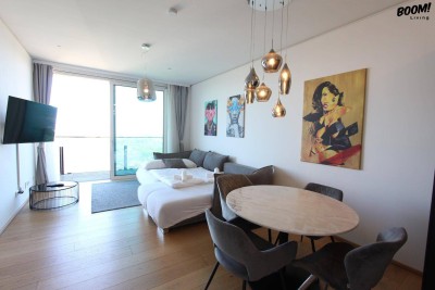 Iconic Living im TRIIIPLE Tower – Architektur, Design und Komfort
