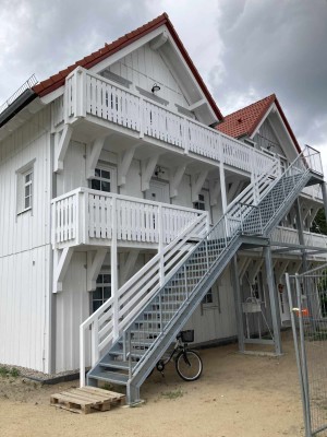 wunderschöne Dachgeschosswohnung mit zwei Balkonen im Holzneubau