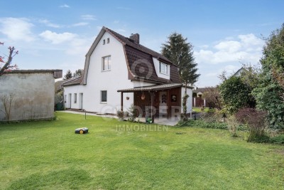 Gemütliches Einfamilienhaus mit Garage und Nebengelass in der Nähe des Falkenhagener Sees