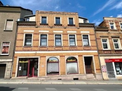 Mehrfamilienhaus mit Laden und 2 freien
