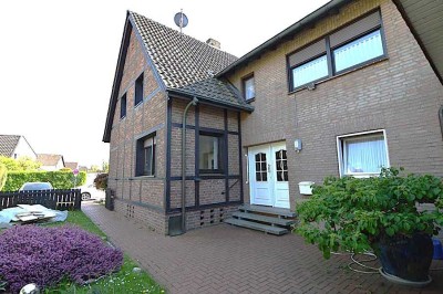 Eigentumswohnung in Form einer Doppelhaushälfte mit 4 SZ und Garten!