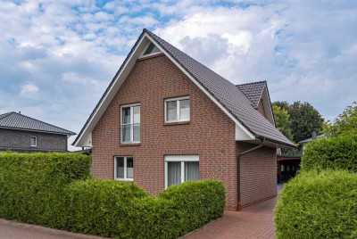 Familienparadies mit Einliegerwohnung, Doppelcarport & Wintergarten in ruhiger Lage von Barßel.