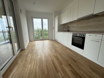 Moderne 4-Zimmer-Wohnung im Erstbezug mit EBK, Gäste-WC und Balkon