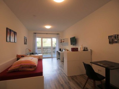 Gartengeschoss – 1-Zimmer-Appartement mit Terrasse und Möblierung!
