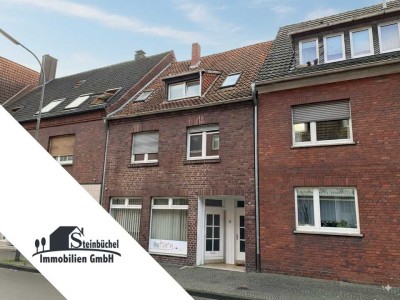 Attraktives Mehrfamilienhaus mit Ladeneinheit und zwei Garagen in gefragter Lage!