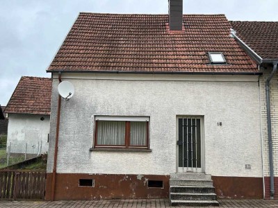 Schönes Baugrundstück mit älterem Einfamilienhaus und Scheune