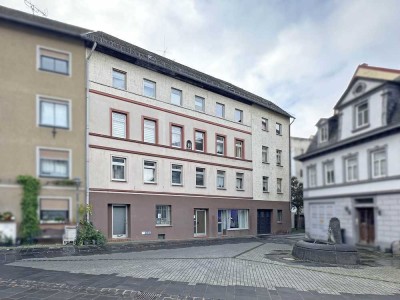 Solides Wohn- / Geschäftshaus mit 9 Einheiten in zentraler Ortslage
