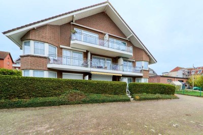 Scharbeutz,  untere Seestraße - 2- Raum- Wohnung mit Balkon und Blick in den Kurpark