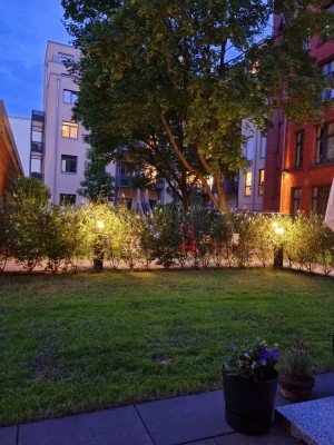 Exklusive Gartenwohnung in zentraler Lage -  Urbaner Luxus mit Ruhefaktor