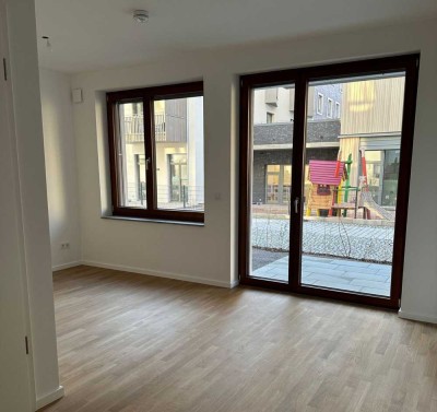 NEUBAU! Lichtdurchflutete Wohnung zum Verweilen mit Garten mit EBK (ablösbar)
