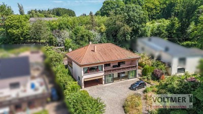 AUSSICHT - freistehendes Einfamilienhaus mit Garagen & Hallenbad in Neunkirchen!