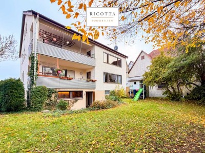 Charmantes 3-Familienhaus mit großzügigen Wohneinheiten und sonnigem Garten