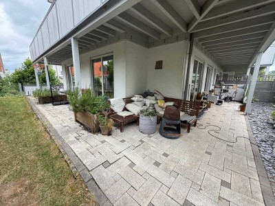 Exklusive Gartenwohnung mit Haus-Charakter – Luxus pur am Fuße der Weinberge