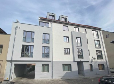 Schicke und moderne Neubauwohnung mit Aufzug, Balkon und EBK