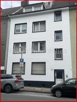 Investitionschance: 2 vermietete Wohnungen u.1 Gewerbeeinheit in gepfl. 4-Parteienhaus in E.-Rü.!