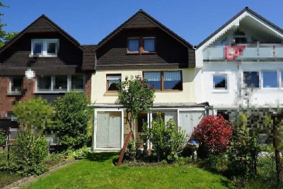 Reihenhaus mit wohnlich ausgebautem Dach, Wintergarten u. Garage in Lev.-Steinbüchel!