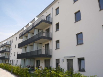 ERSTBEZUG: 3-Zimmer-ETW mit Balkon, Aufzug, TG-Stpl., barrierefrei