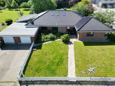 Gehobenes Einfamilienhaus mit Büro, großem Garten sowie Wintergarten im Gewerbegebiet Schönbergs