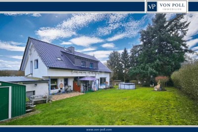 Traumhafte Aussichtslage am Feld- und Waldrand: Vermietetes 2-Familienhaus mit Doppelgarage+ Stellpl