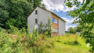 Sanierungsbedürftiges Einfamilienhaus auf weitläufigem Grundstück in Gerolsbach