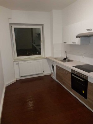1-Zi-EG-Appartement mit EBK & Holzdielen in Huttrop
