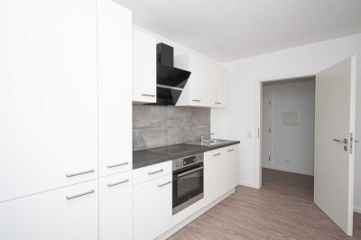 Komplett-sanierte 2-ZKB mit Aufzug, teilmöbliert inkl. Einbauküche und Garagenstellplatz