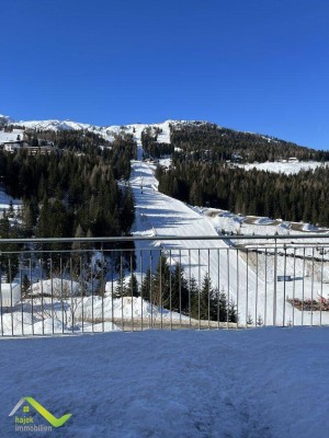 Hajek Immobilien präsentiert - Nassfeld - Traumwohnung direkt an der Skipiste