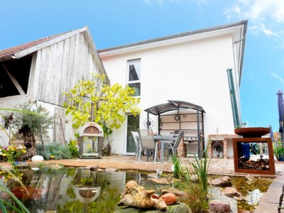 Neuwertiges Einfamilienhaus mit Gartenidylle & Doppelgarage in ruhiger Top-Lage von Muggensturm