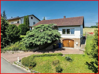 Ihr neues Zuhause im Grünen – Charmantes Einfamilienhaus mit traumhaftem Grundstück
