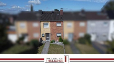 Charmantes Reihenmittelhaus mit schön angelegtem Garten und gutem Raumkonzept in zentraler Lage