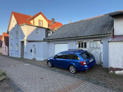 EFH mit Elw., uneinsehbarem Innenhof, großzügigem Gartengrundstück, Neben u.- Garagengebäude