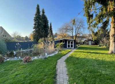 Stadtflucht-Highlight: Saniertes Familienhaus mit Traumgarten & Teich – Düsseldorf nah!