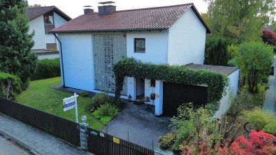 Grüne Oase in Ottobrunn: Einfamilienhaus mit weitläufigem Garten