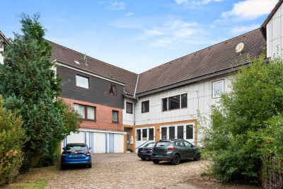 Kapitalanlage – Mehrfamilienhaus mit Baugrundstück in ruhiger Lage von Espenau!
