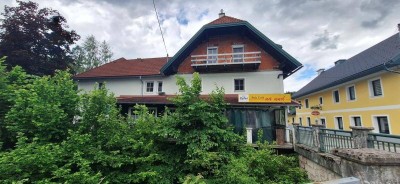 WOHN- UND GESCHÄFTSHAUS MIT 4 WOHNEINHEITEN, 1LOKAL, 6 GARAGEN, GROSSEM HOLZSCHUPPEN &amp; EIGENEM QUELLWASSER