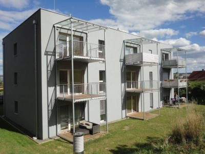 Sonnige Neubauwohnung im Zentrum mit Terrasse und inkl. Carportabstellplatz