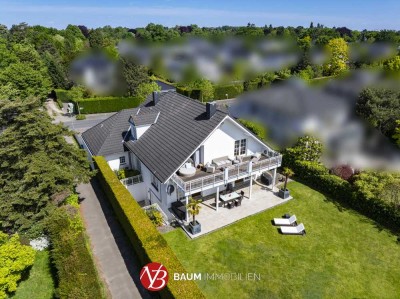 Alt-Meererbusch! Exklusive Landhausvilla mit Innenpool auf Südgrundstück nahe Golfplatz