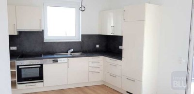 Erstbezug -Niedrigenergiehaus mit höchstem Wohnkomfort!! Balkon, Stellplatz...